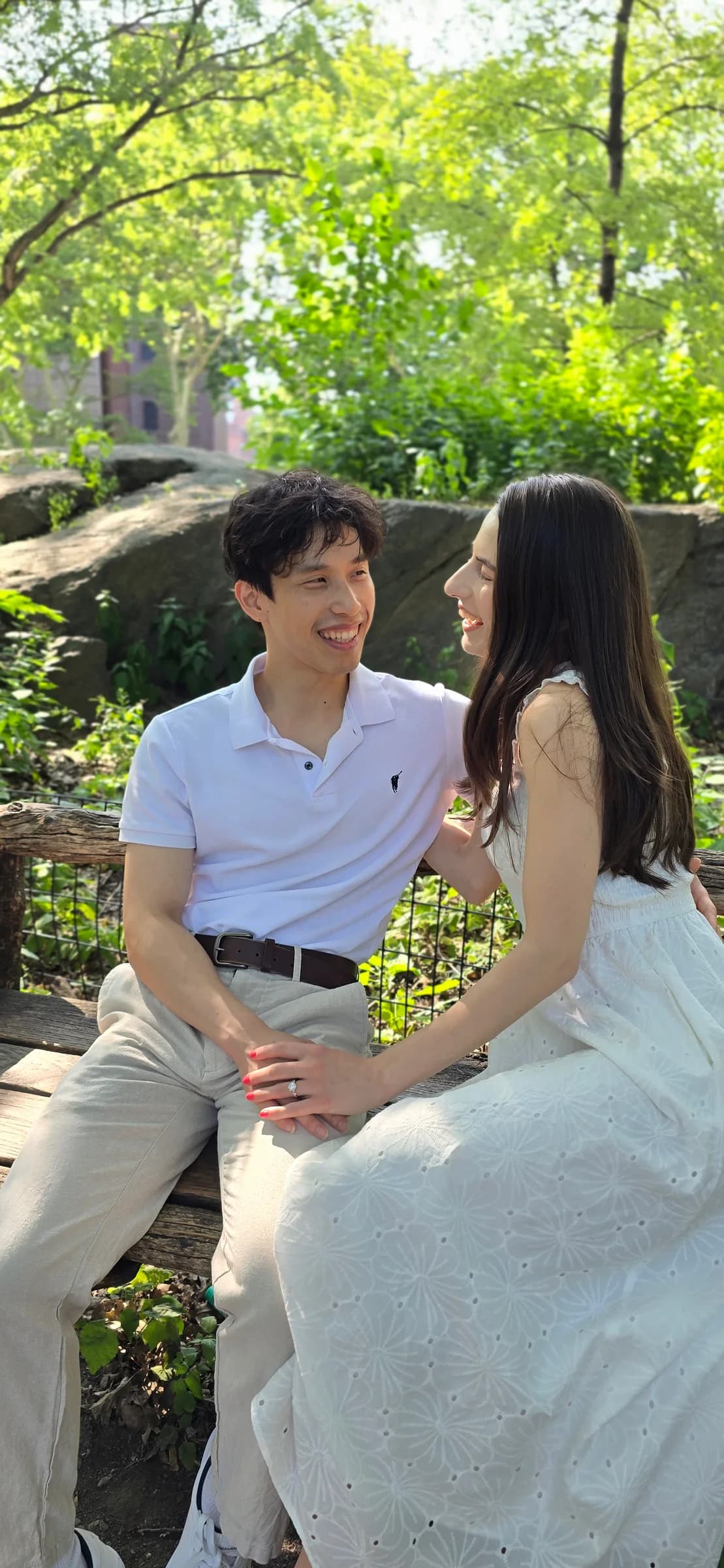 The couple together in a vertical portrait